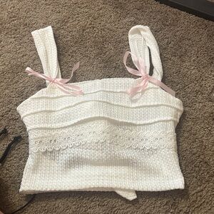 white tank with bows